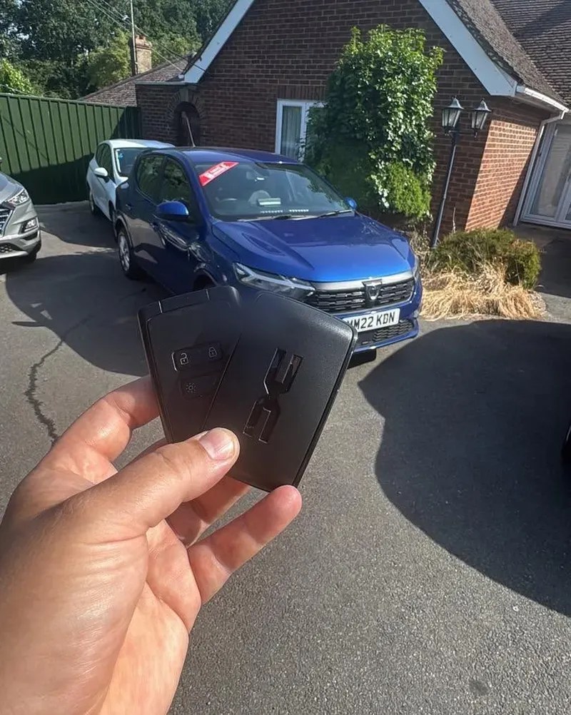 Dacia opened without damage and a new key supplied on a driveway